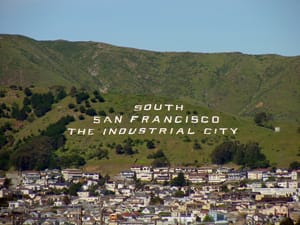 south san francisco orthodontist Large white letters on a hillside read "SOUTH SAN FRANCISCO THE INDUSTRIAL CITY" above a residential area, where you might find a top-rated South San Francisco orthodontist.